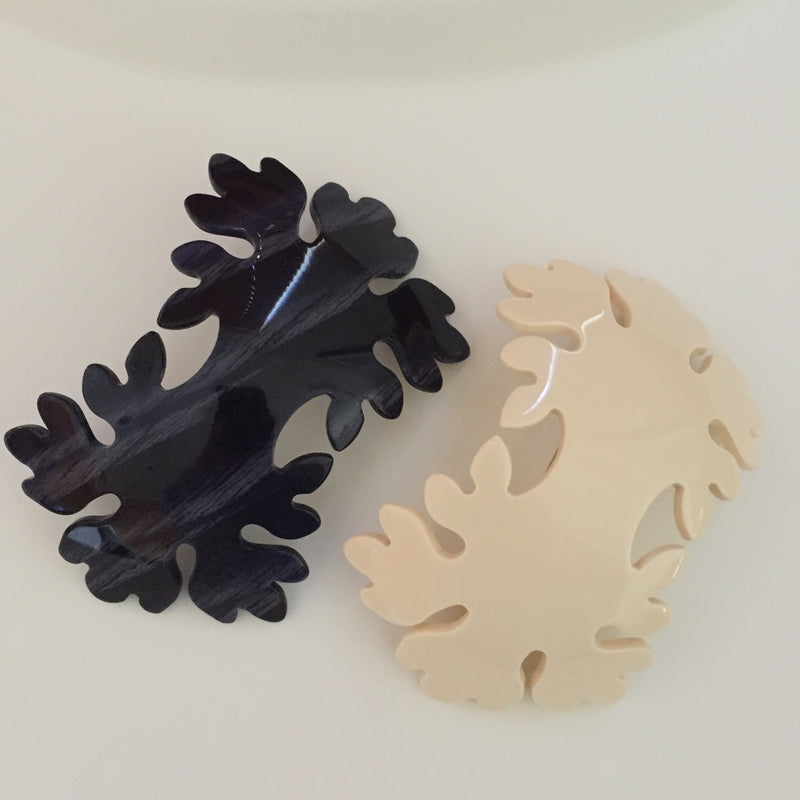  https://4sisters1closet.com/products/french-atelier-barrette-luxe Double leaf barrette. 2.5 x 4 Made in France. Sold by 4Sisters1Closet
