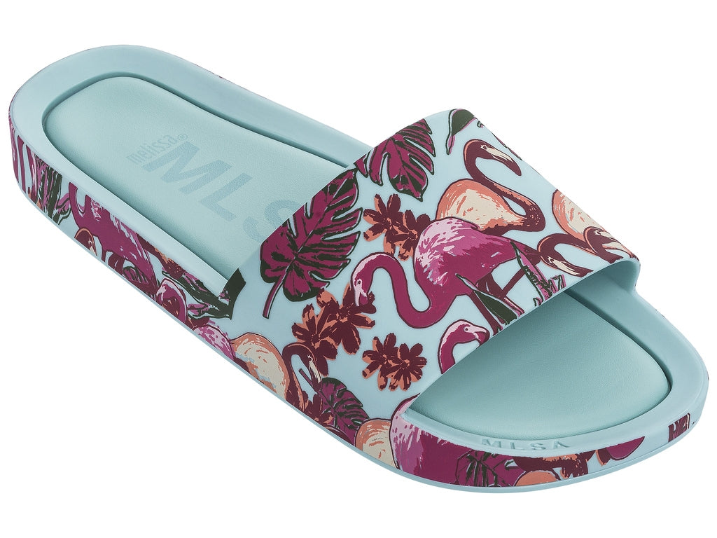  https://4sisters1closet.com/products/melissa-beach-slide-green-pink-flamingos Casually chic slide sandal crafted from fruit-scented PVC. Sold by 4Sisters1Closet