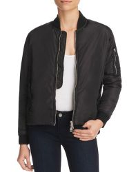 Bomber jacket with high low waist. Pocket detail with zipper. Sold by 4Sisters1Closet